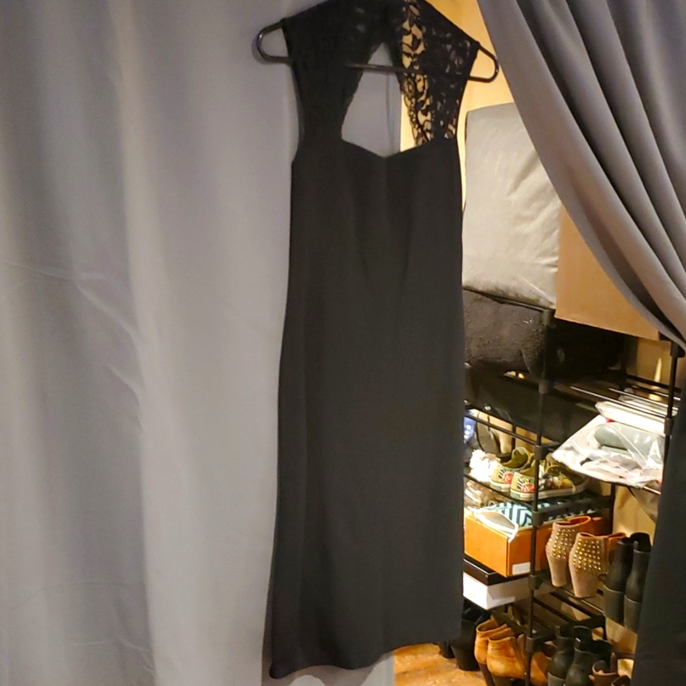 Black dress. Lace detailed shoulders